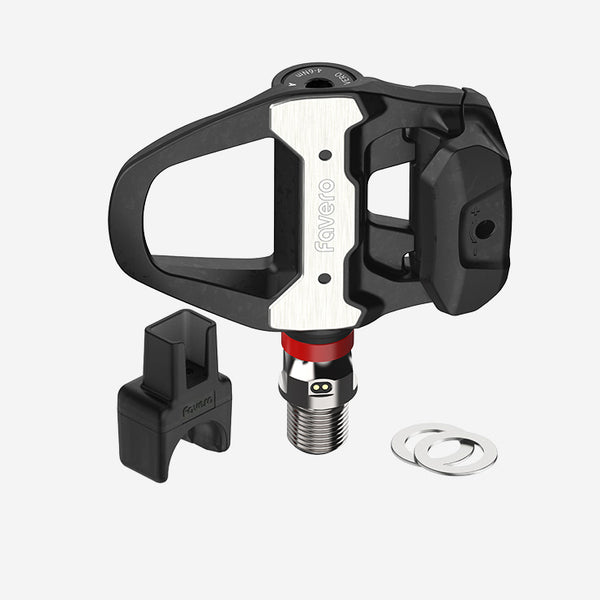 Assioma PRO RS‑UP kit with right-side power pedal, magnetic charger, and washers