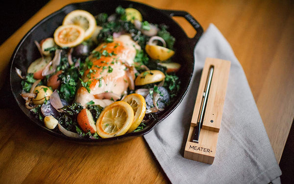 MEATER Plus Long Range Smart Wireless Meat Thermometer with cooked meat served in a plate