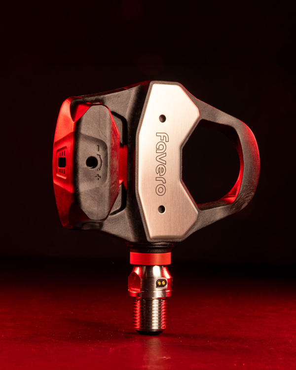 Favero Assioma PRO RL-1 power meter pedal side detail with red lighting highlighting build quality