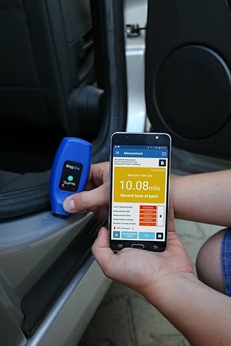 NexPTG paint thickness gauge detecting second paint layer indicating repaint on car panel