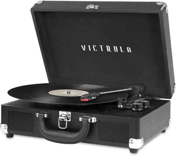 Victrola Bluetooth suitcase turntable open with vinyl playing