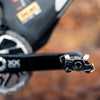 Favero Assioma PRO MX‑UP kit including right power pedal sensor, magnetic charging connectors, and washers