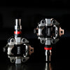 Favero Assioma PRO MX‑UP kit including right power pedal sensor, magnetic charging connectors, and washers