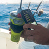 User holding ACR GlobalFix V6 EPIRB with smartphone app for GPS testing and emergency readiness