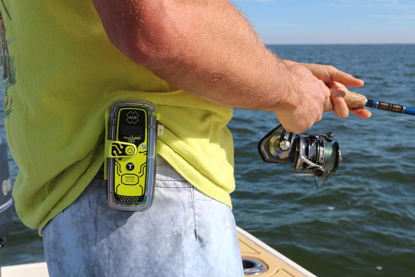 ACR ResQLink View personal locator beacon attached to user while fishing on water for marine safety