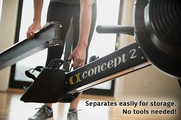 User separating Concept2 RowErg for storage demonstrating easy portability and setup
