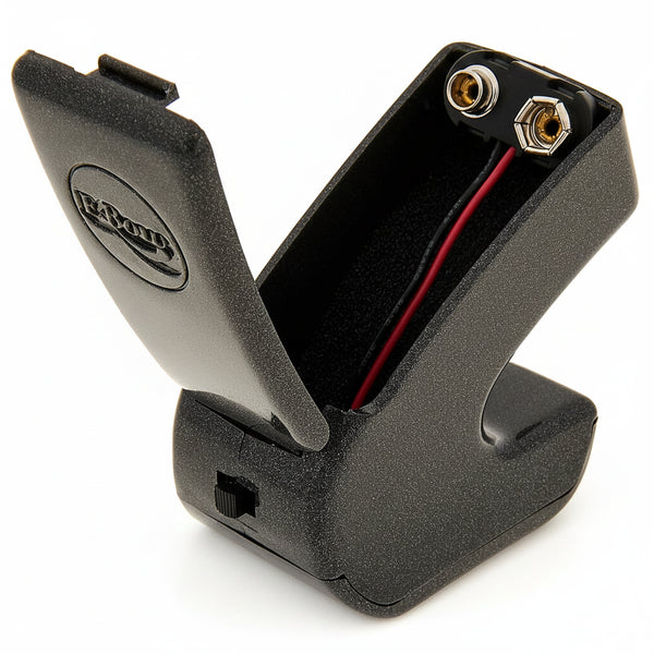 Ebow Plus open battery compartment with 9V battery clip for powering electronic guitar sustainer