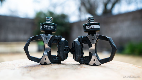 Smartphone screen showing Favero Assioma app with IAV Cycling Dynamics and L/R balance data.