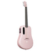 A pink guitar on a white background - LAVA ME 3, a 38" Carbon Fiber Smart Acoustic Guitar with built-in effects and HILAVA OS.