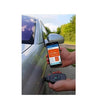 Using NexPTG coating thickness gauge on car panel with smartphone app displaying paint thickness data