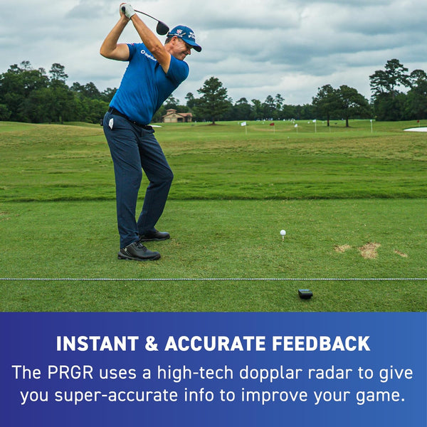 Golfer using PRGR portable launch monitor during swing practice for instant radar feedback