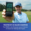 Professional golfer holding PRGR portable launch monitor on golf course for swing tracking and distance analysis