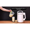 Fresh soy milk being poured from SoyaJoy G5 milk maker into a glass at home