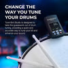 Tune-Bot Studio drum tuner placed on drum helping musicians tune drums quickly and accurately