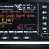 Uniden SDS200 base station scanner front panel with color screen showing police radio channels and control buttons