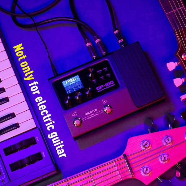 Valeton GP-100 multi effects processor setup with electric guitar keyboard and cables for music production