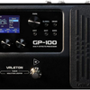 Valeton GP-100 multi effects processor close up showing control panel display knobs and expression pedal