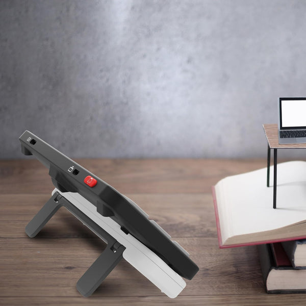 Zoomax Luna 6 video magnifier placed on desk with adjustable stand for hands free reading